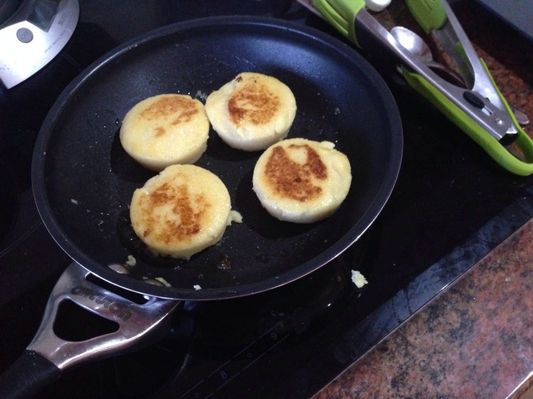 Frying polenta in butter.