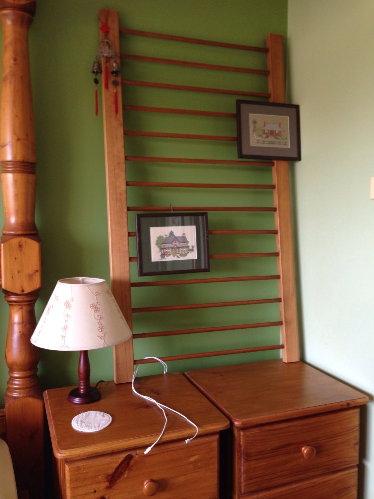 Cot side re-used as a bedside display.