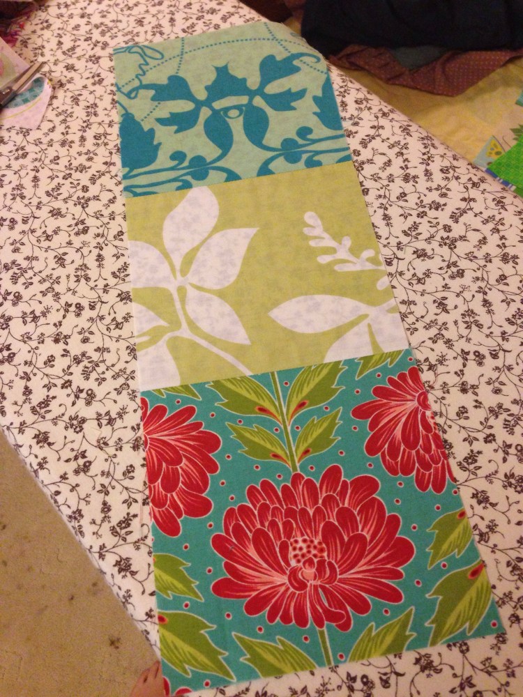 Three squares pieced vertically.