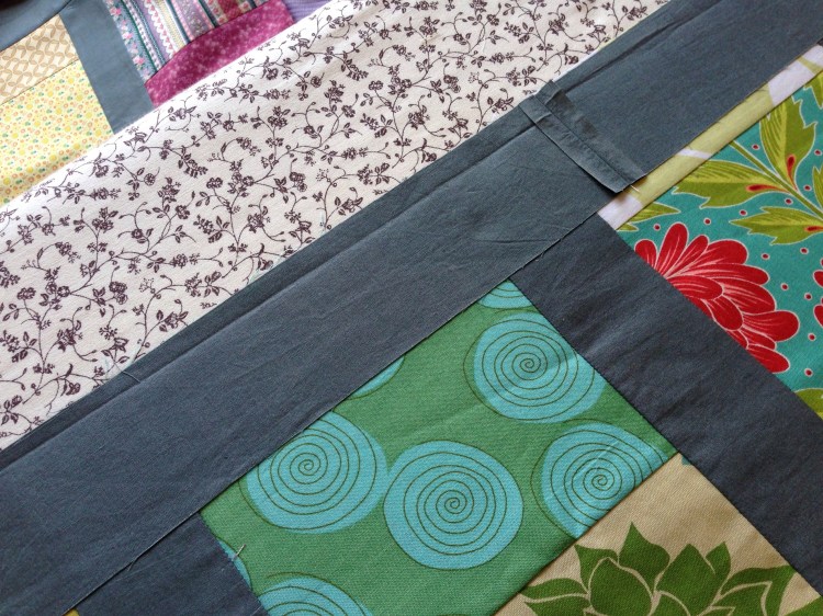 The seam falls just to the right of the vertical on this row.