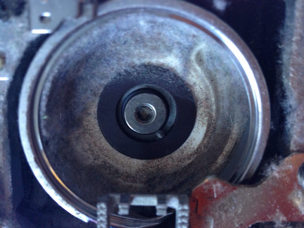 Masses of dirt under bobbin case