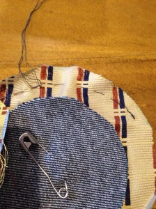 Running stitches around the edge