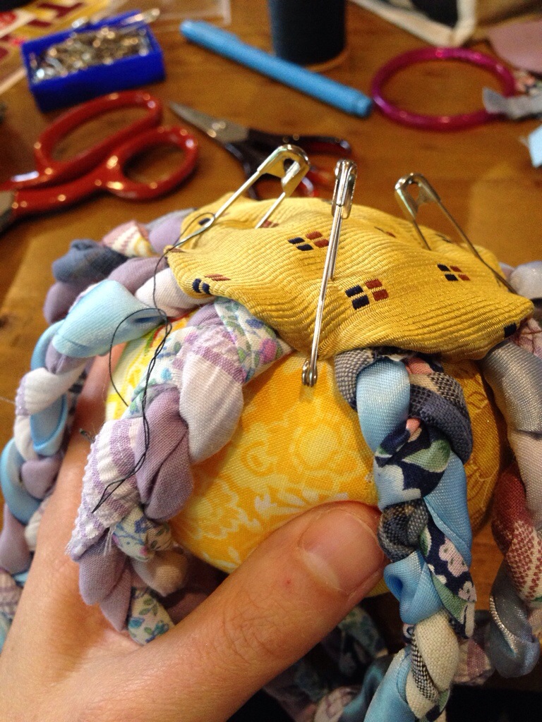 Botom piece pinned over the legs