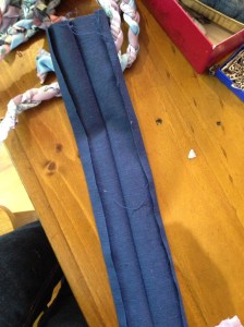 Pressed strip of fabric