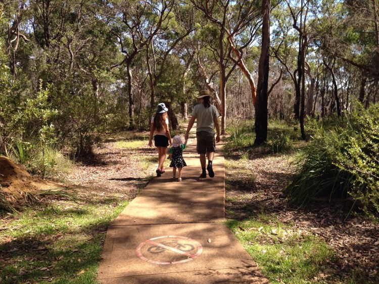 Stephen and the Kids walking along a bush path