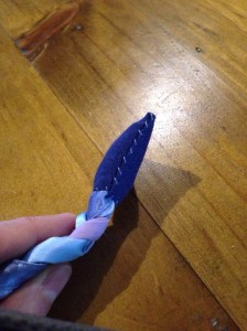 Stitching around the plait