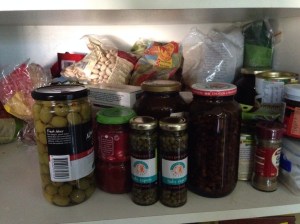Cluttered pantry shelf