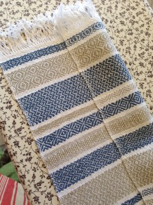 Striped coloured towel with twill patterns