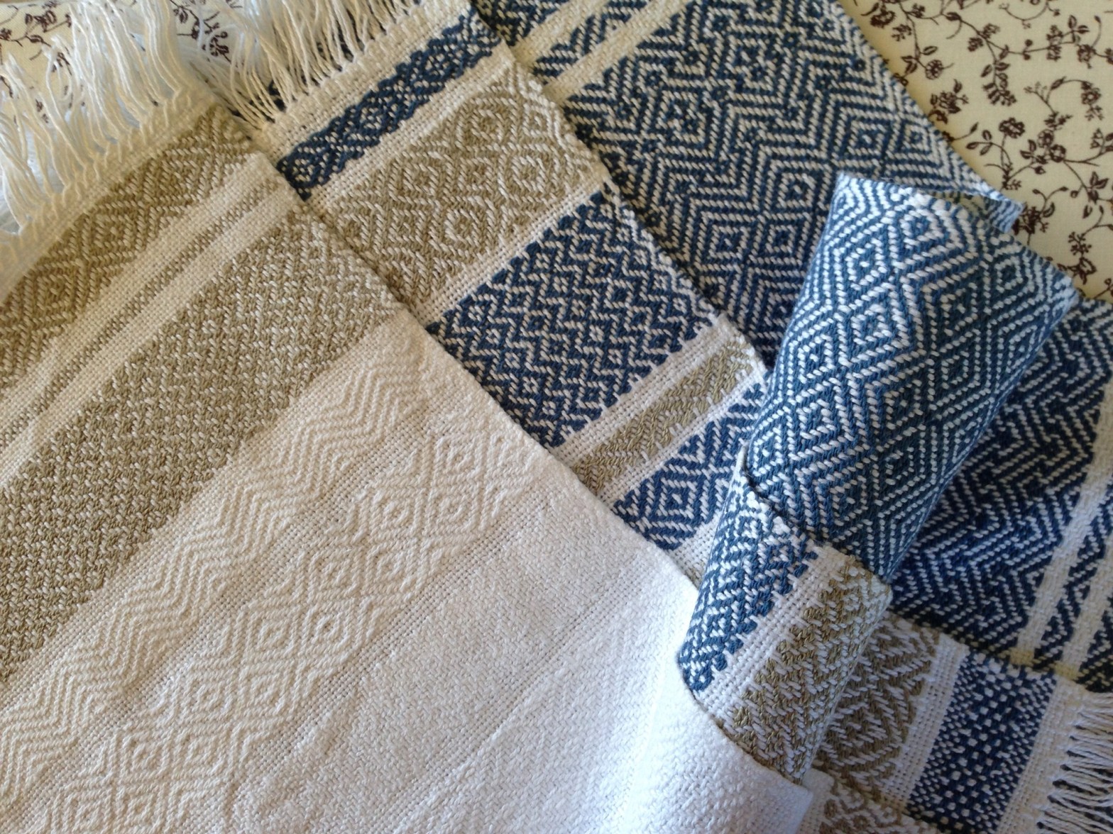 Three handwoven tea towels