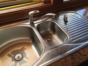 Plugs in drain holes.