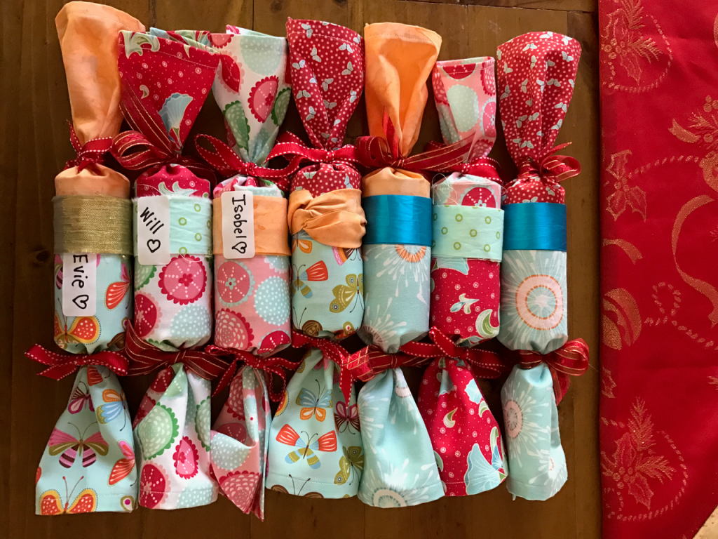 Picture of various fabric Christmas crackers.